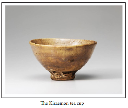 The Kizaemon tea cup, a worn brown bowl
